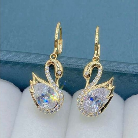 Elegant Gold Swan Earrings - Picture 2 of 4